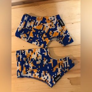 Sleefs. Blue gold white. Size small